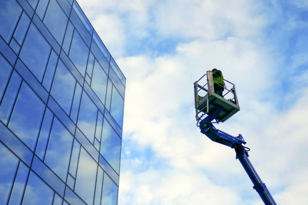 a modern glass liftinig equipment for installing glass in taller buildings in the United States
