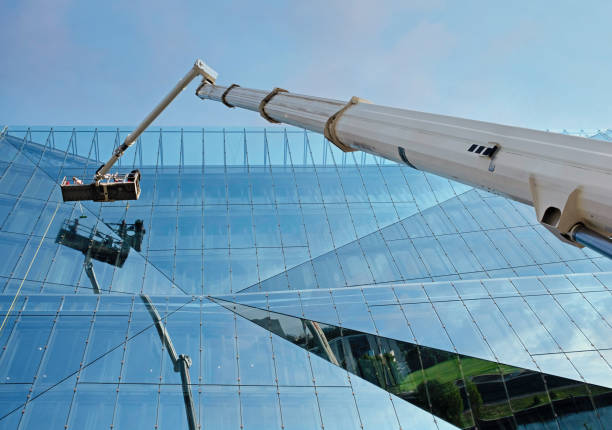 A longer crane for lifting glass in skycraper windows and walls in United States